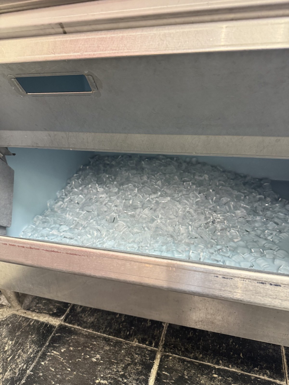 Commercial ice bin filled with clear cubes — commercial ice machine repair, Armus Refrigeration (MA & RI)
