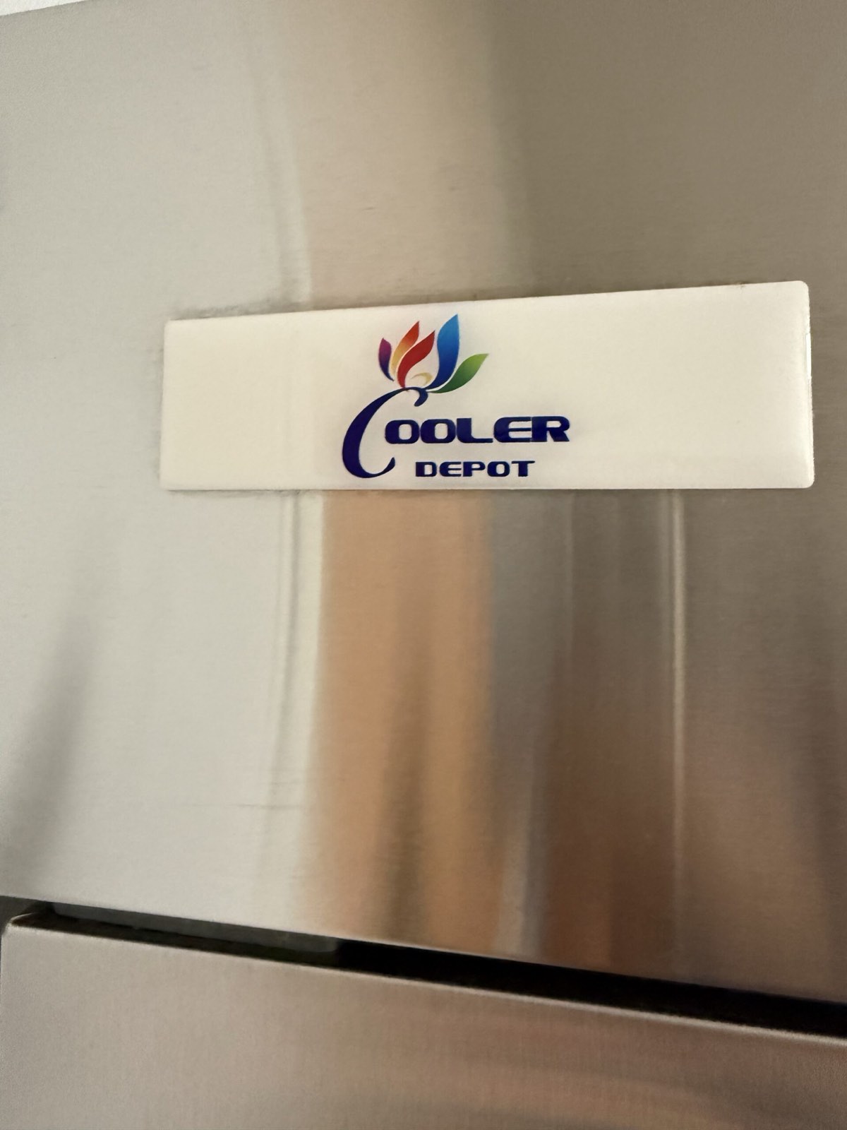 Cooler Depot logo on stainless steel wall — walk-in cooler repair, Armus Refrigeration (MA & RI)
