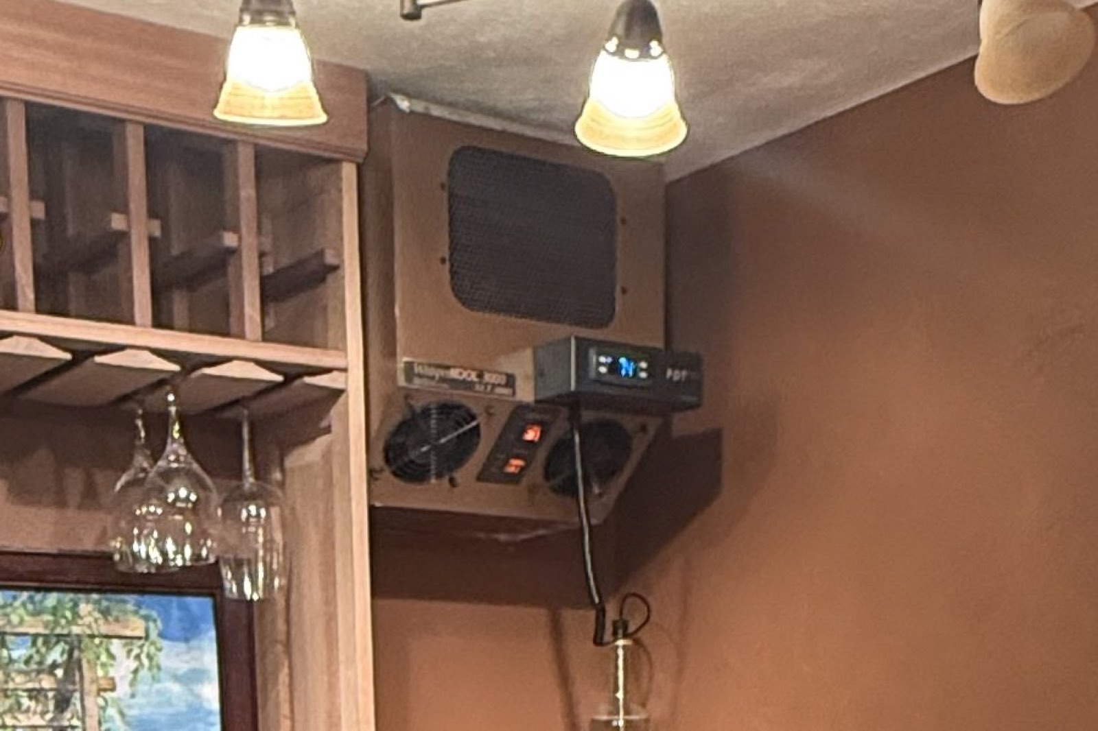 Wine cellar cooling unit controller reading 58°F after repair — wine cooler repair by Armus Refrigeration (MA & RI)